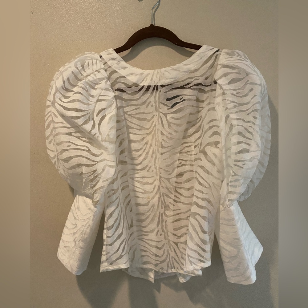 Sheer white zebra print blouse with puffy sleeves